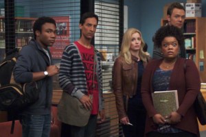 The cast of Community looking shocked