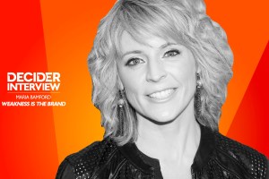 Maria Bamford in black and white on a bright orange background