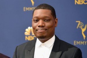 Michael Che on a red carpet