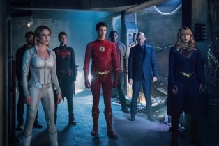 Arrow -- "Crisis on Infinite Earths: Part Four" -- Image Number: AR808B_0399r.jpg -- Pictured (L-R): Osric Chau as Ryan Choi, Caity Lotz as Sara Lance/White Canary, Ruby Rose as Kate Kane/Batwoman, Grant Gustin as The Flash, David Harewood as Hank Henshaw/J'onn J'onzz, Jon Cryer as Lex Luthor and Melissa Benoist as Kara/Supergirl