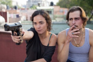 Alice Braga pointing a gun in Queen of the South