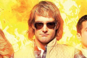 MacGruber film key art - Will Forte in front of flaming background