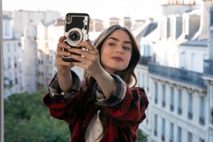 Lily Collin taking a selfie in Emily in Paris
