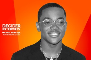 Michael Rainey Jr. in black and white on a bright orange background
