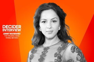 Annet Mahendru in black and white on a bright orange background