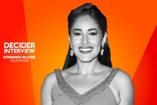 Q’orianka Kilcher in black and white on a bright orange background