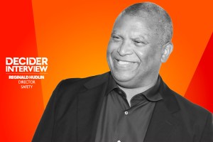 REGINALD HUDLIN in black and white on a bright orange background