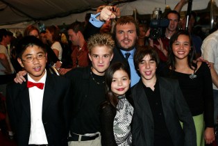 TORONTO - SEPTEMBER 10: Jack Black (back) with the child cast members (L-R) Robert Tsei, Kevin Clark (1988 - 2021), Miranda Cosgrove, Joey Gaydos and Rebecca Brown attend the gala screening for "School of Rock" during the 2003 Toronto International Film Festival on September 10, 2003 in Toronto, Canada. (Photo by Donald Weber/Getty Images)