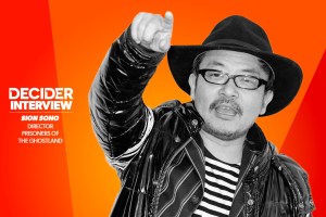 SION SONO Lily Rabe in black and white on a bright orange background