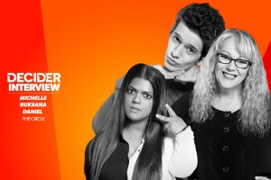 Michelle, Ruksana, and Daniel from The Circle in black and white on a bright orange background