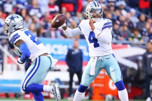 Dak throwing the ball