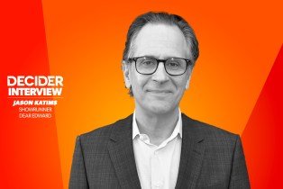 Jason Katims in black and white on a bright orange background