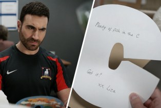 Brett Goldstein as Roy Kent in 'Ted Lasso' beside a card in the shape of the letter C that reads, "Plenty of fish in the C. Get it? xx Liza."