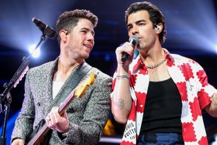 Nick Jonas, Joe Jonas performing together