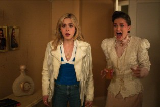 Two young girls screaming in a still from the upcoming movie TOTALLY KILLER