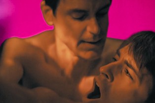 Matt Bomer and Jonathan Bailey sex scene in 'Fellow Travelers' in front of pink background