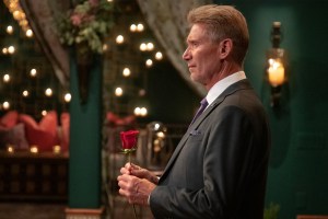 Gerry Turner holding a rose on 'The Golden Bachelor'