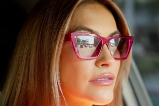 Chrishell Stause wearing pink sunglasses on 'Selling Sunset'