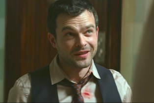Alden Ehrenreich with blood on his shirt in a scene from Fair Play