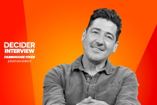 Jonathan Knight in black and white on a bright orange background