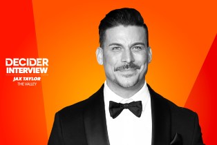 Jax Taylor in black and white on a bright orange background