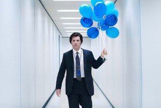 Adam Scott holding blue balloons in a white hallway in 'Severance'