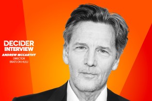 ANDREW MCCARTHY in black and white on a bright orange background