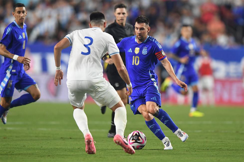 Lionel Messi #10 of the Argentina National Team battles for the ball with Nicolas Samayoa #3 of the Guatemala National Team