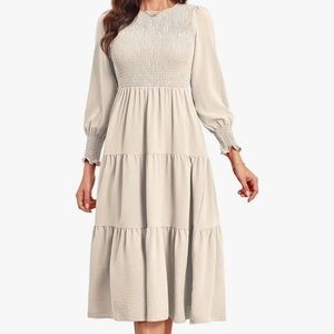 Smocked top long sleeved dress