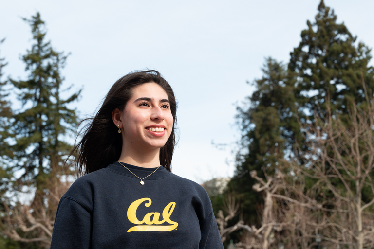 Student smiling and looking to the distance