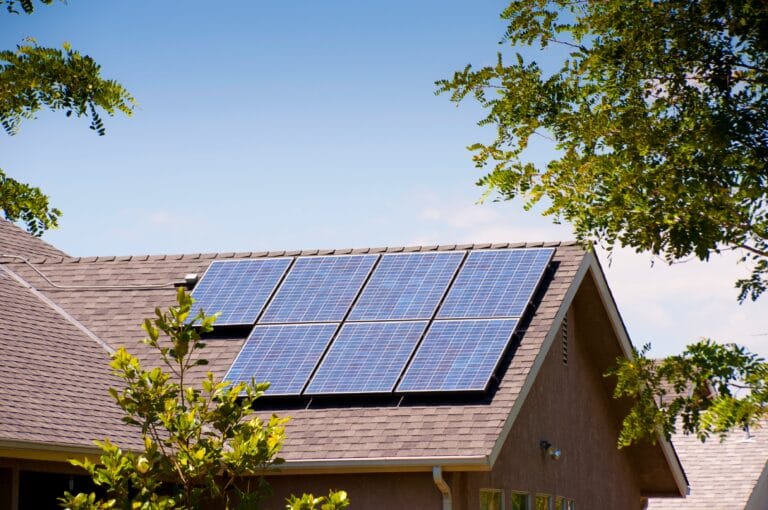 Solar panels on the roof of a home on a sunny day