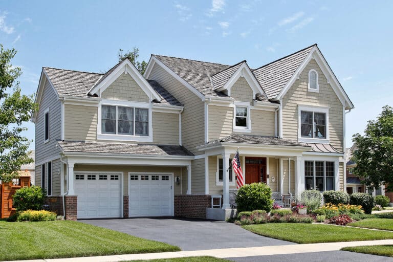 Suburban home with front porch and cedar roof