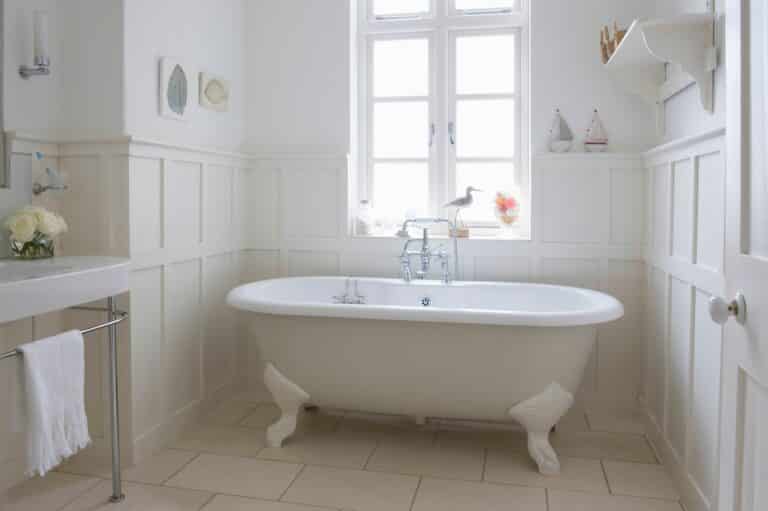 Freestanding bathtub in bathroom