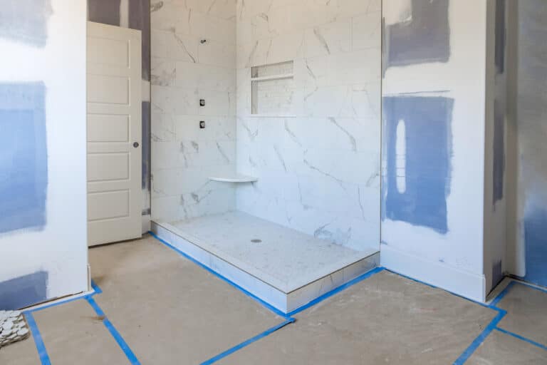 Renovation construction of master bathroom with new under construction bathroom interior drywall ready for tile