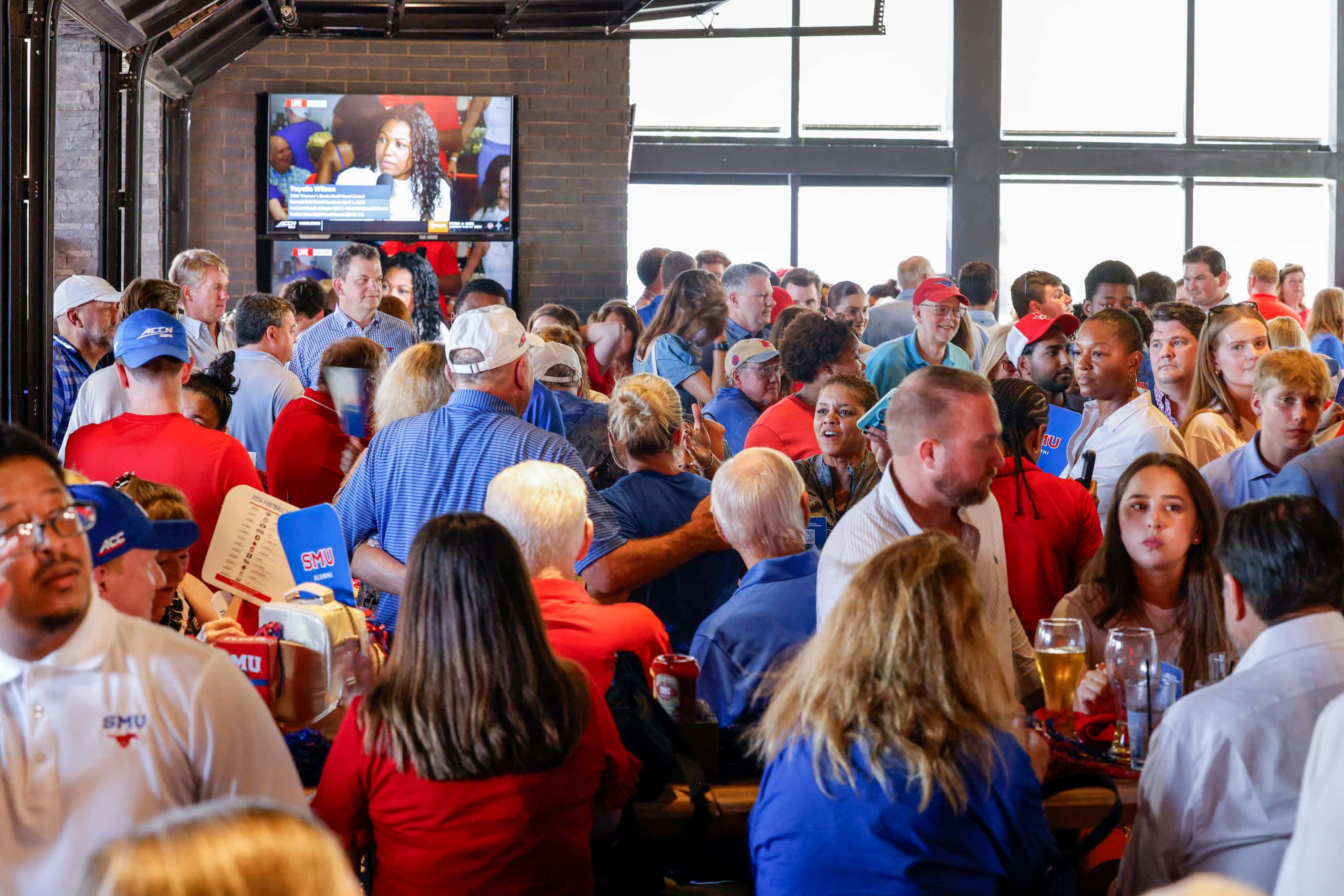 SMU supporters and alumni gather during a celebration of SMU’s first day in the ACC at...
