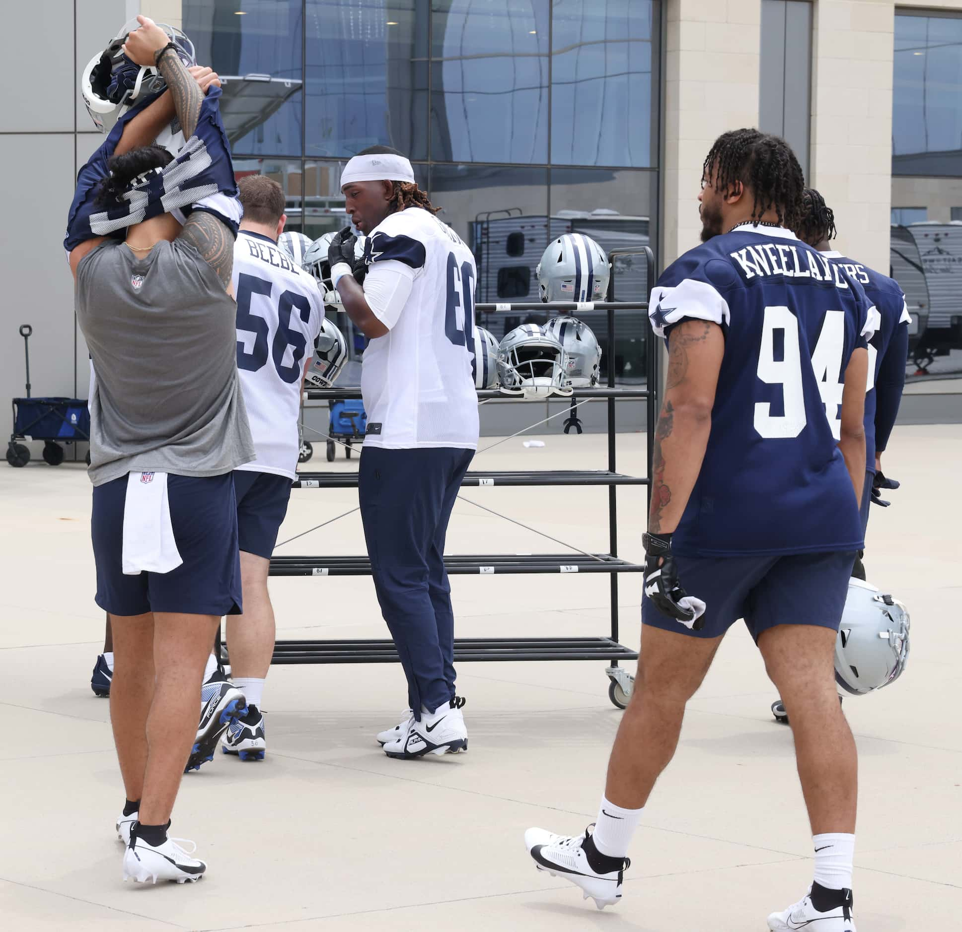 Top Dallas Cowboys draft picks (from left) Marist Liufau (35), Cooper Beebe (56), Tyler...