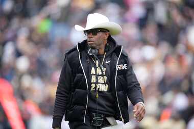 Colorado head coach Deion Sanders looks on in the first half of the team's spring practice...