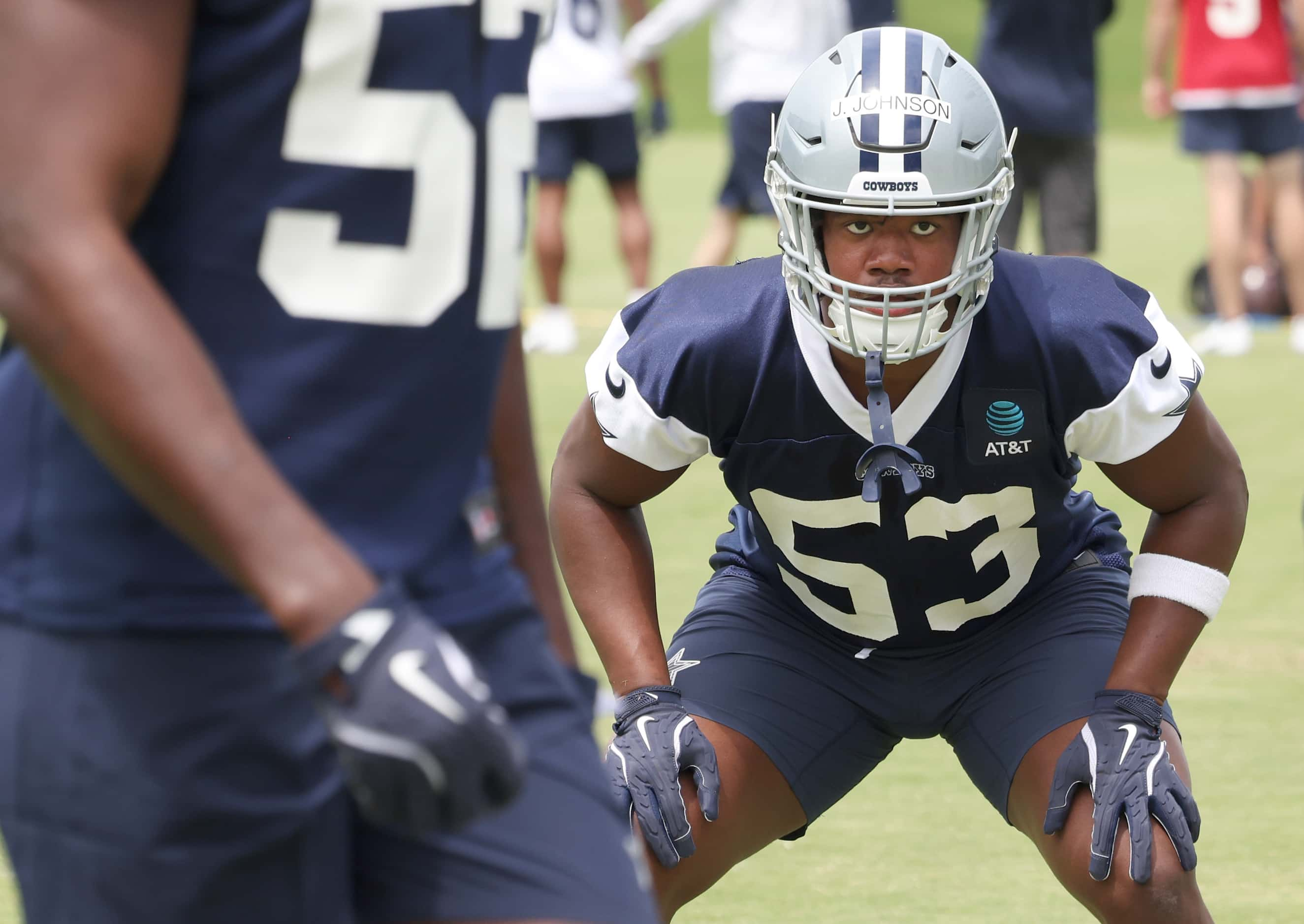 Dallas Cowboys linebacker Jason Johnson (53) is focused as he awaits the snap during a...