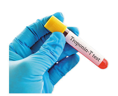 photo of a gloved hand holding a test tube with a yellow cap and a label reading troponin-T test