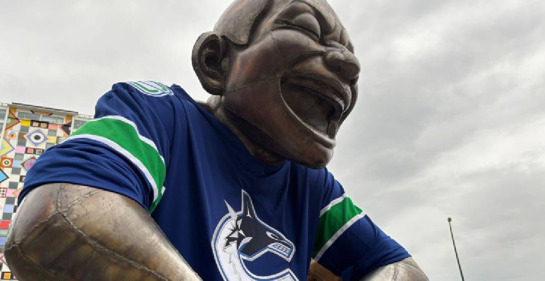 "A-maze-ing Laughter" statues in Vancouver wearing Canucks jerseys. Saturday, May 4, 2024. (Megan Devlin/Daily Hive)