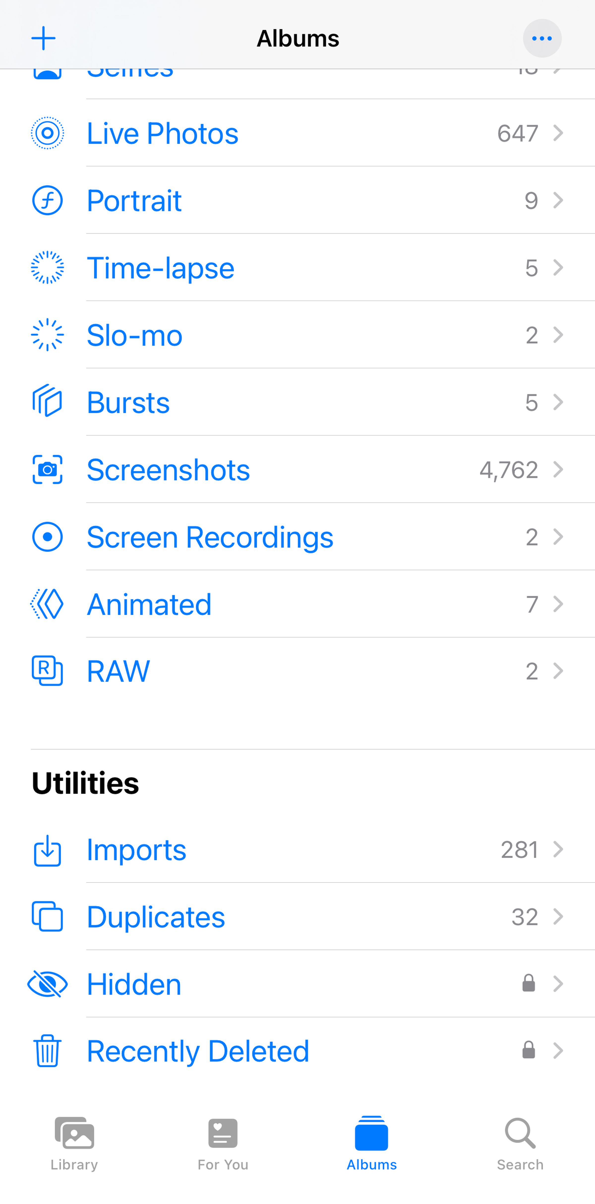 iPhone screen with list of features; at bottom, under Utilities, there is a Recently Deleted entry.