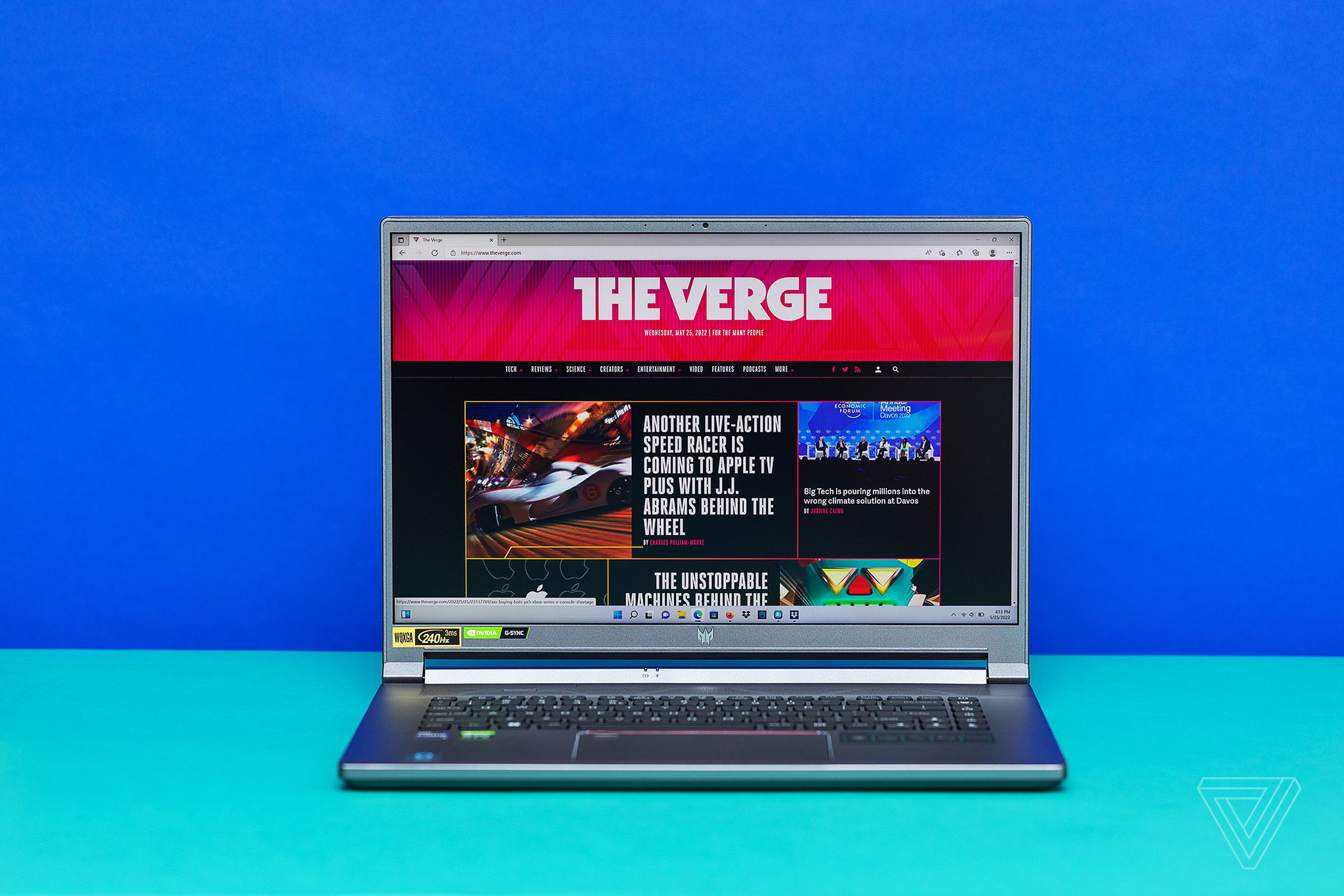 A front on photo of the Acer Predator Triton 500 SE gaming laptop on a blue background