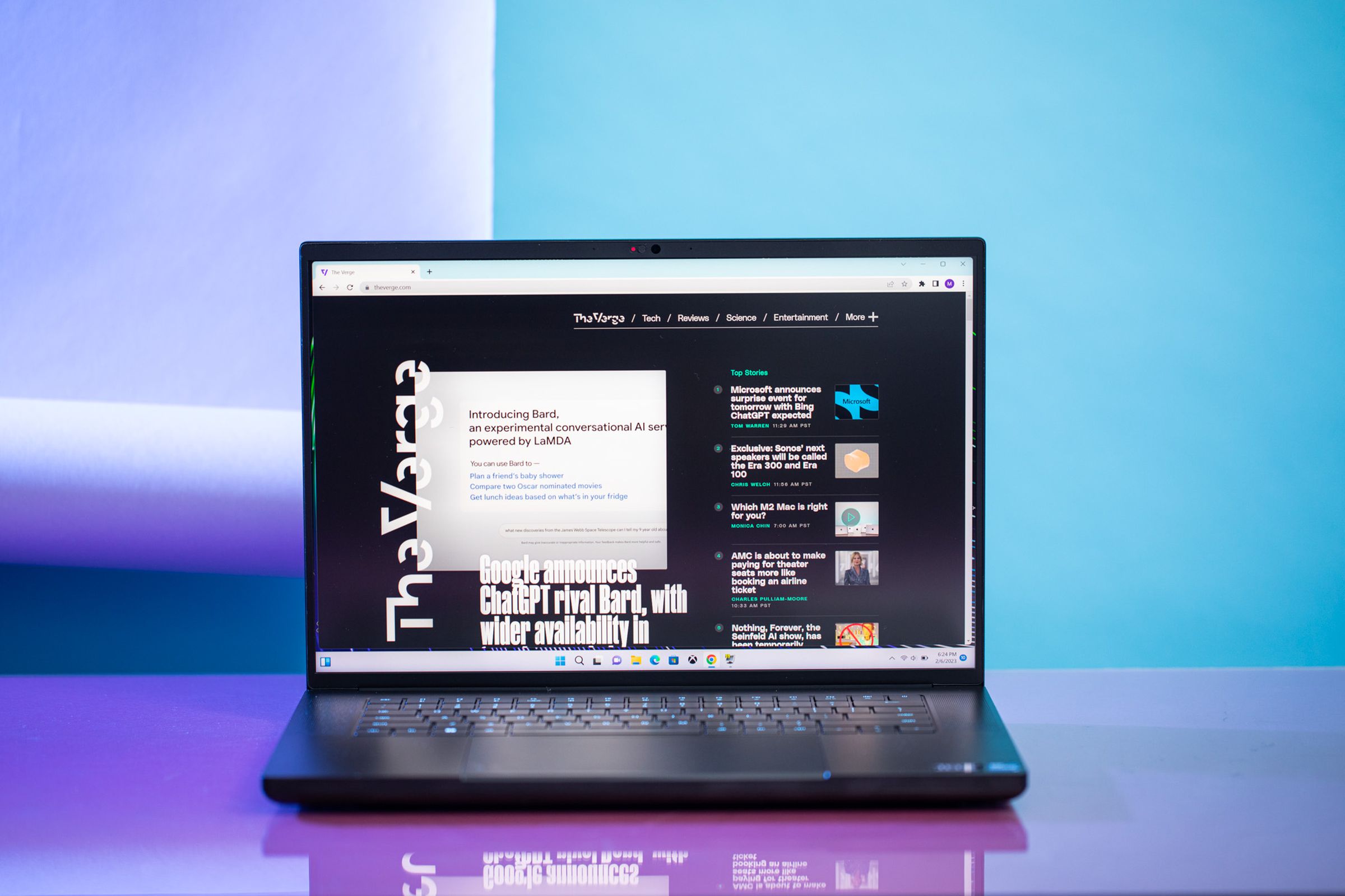 The Razer Blade 16 displays The Verge homepage.