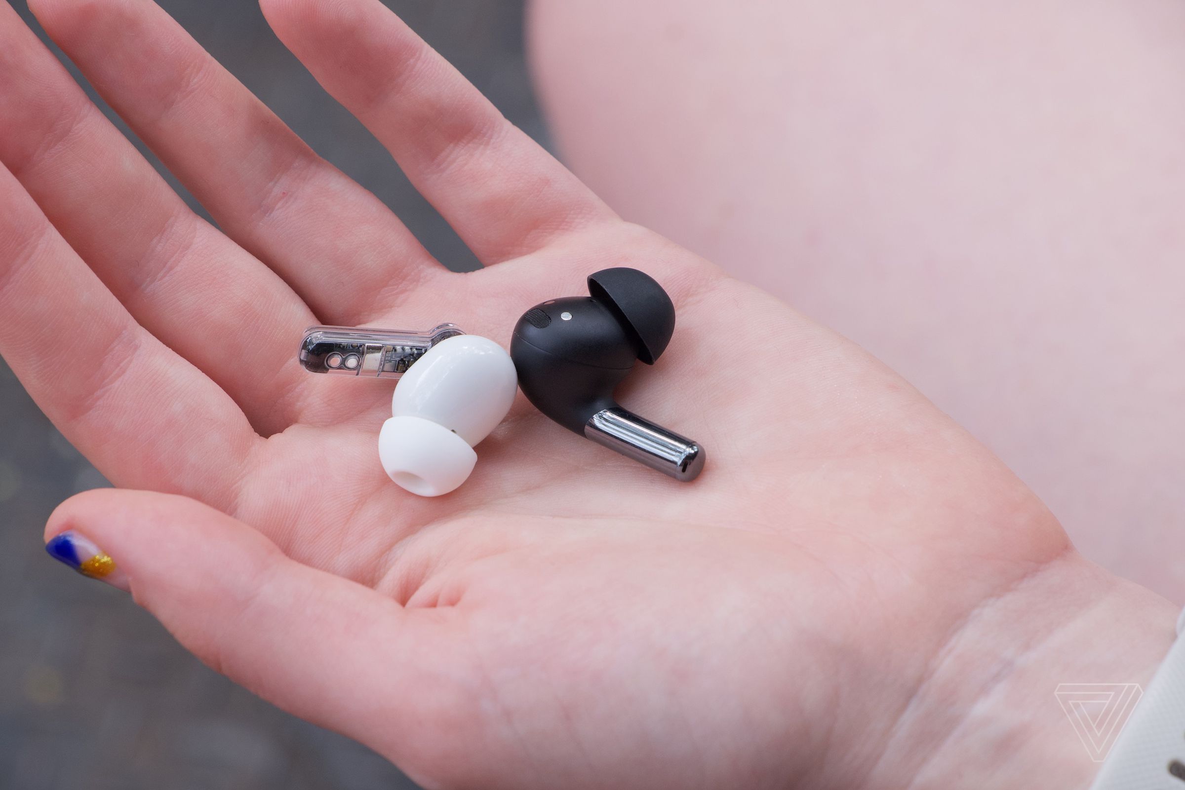 Both earbuds have a stemmed design.