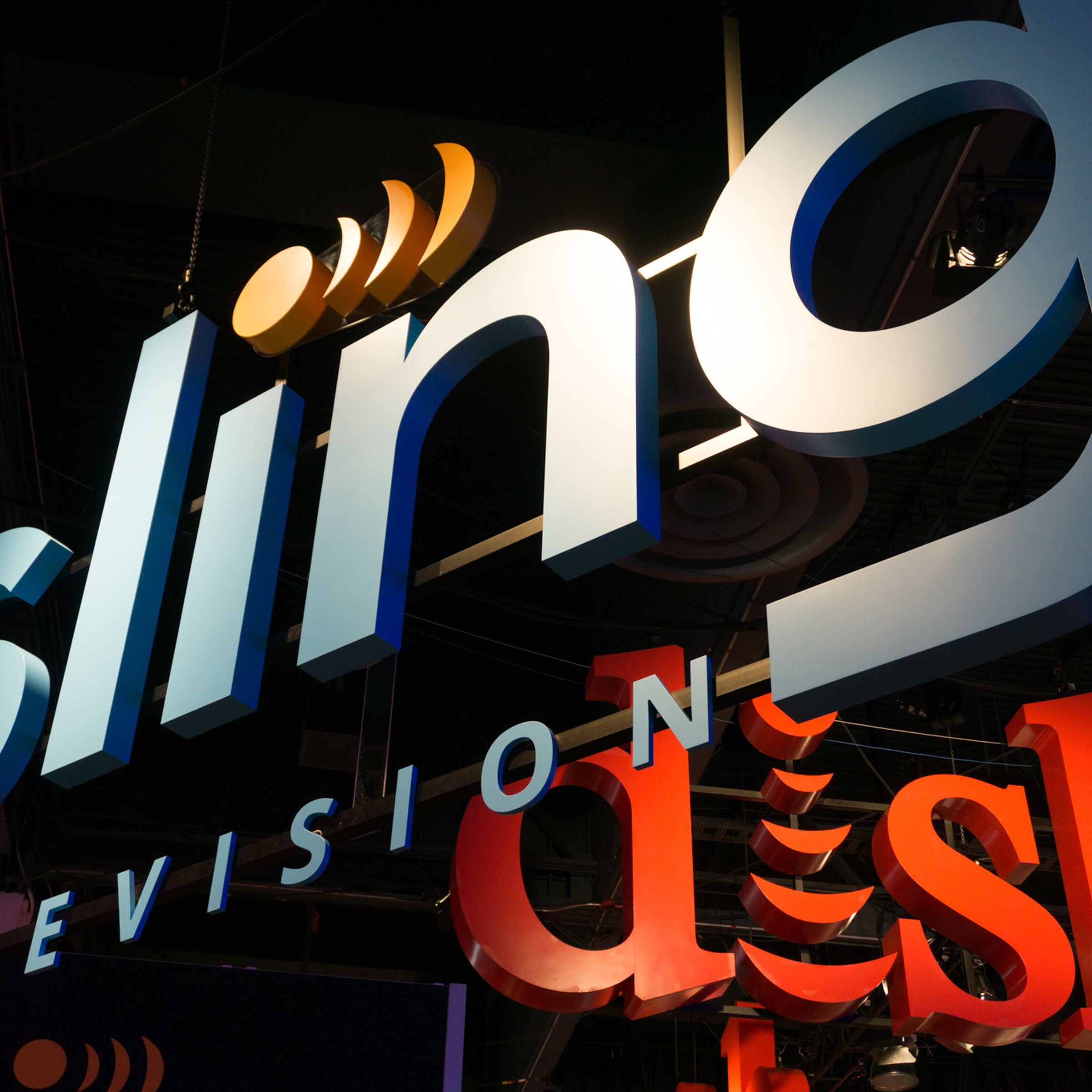 Dish owns Sling TV, and here’s a picture of their juxtaposed hanging signage with big 3D letters that we took way back during its debut in 2015.