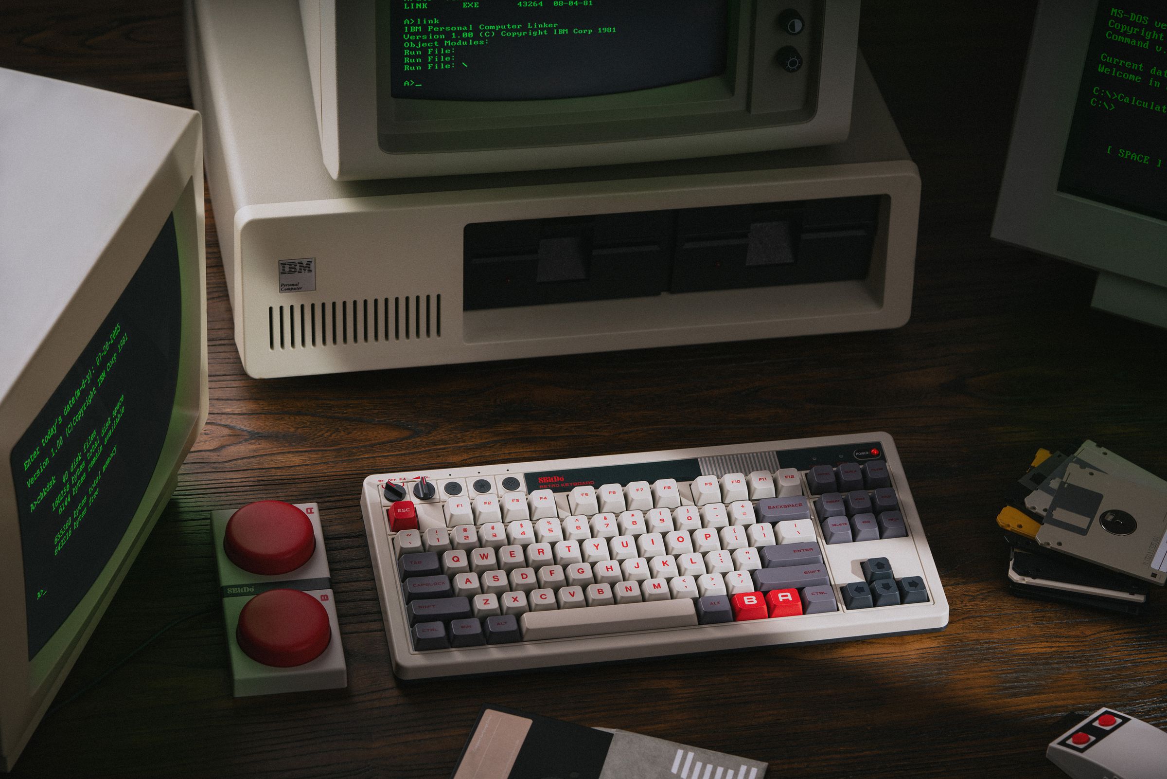 Keyboard on desk next to “Super Buttons.”