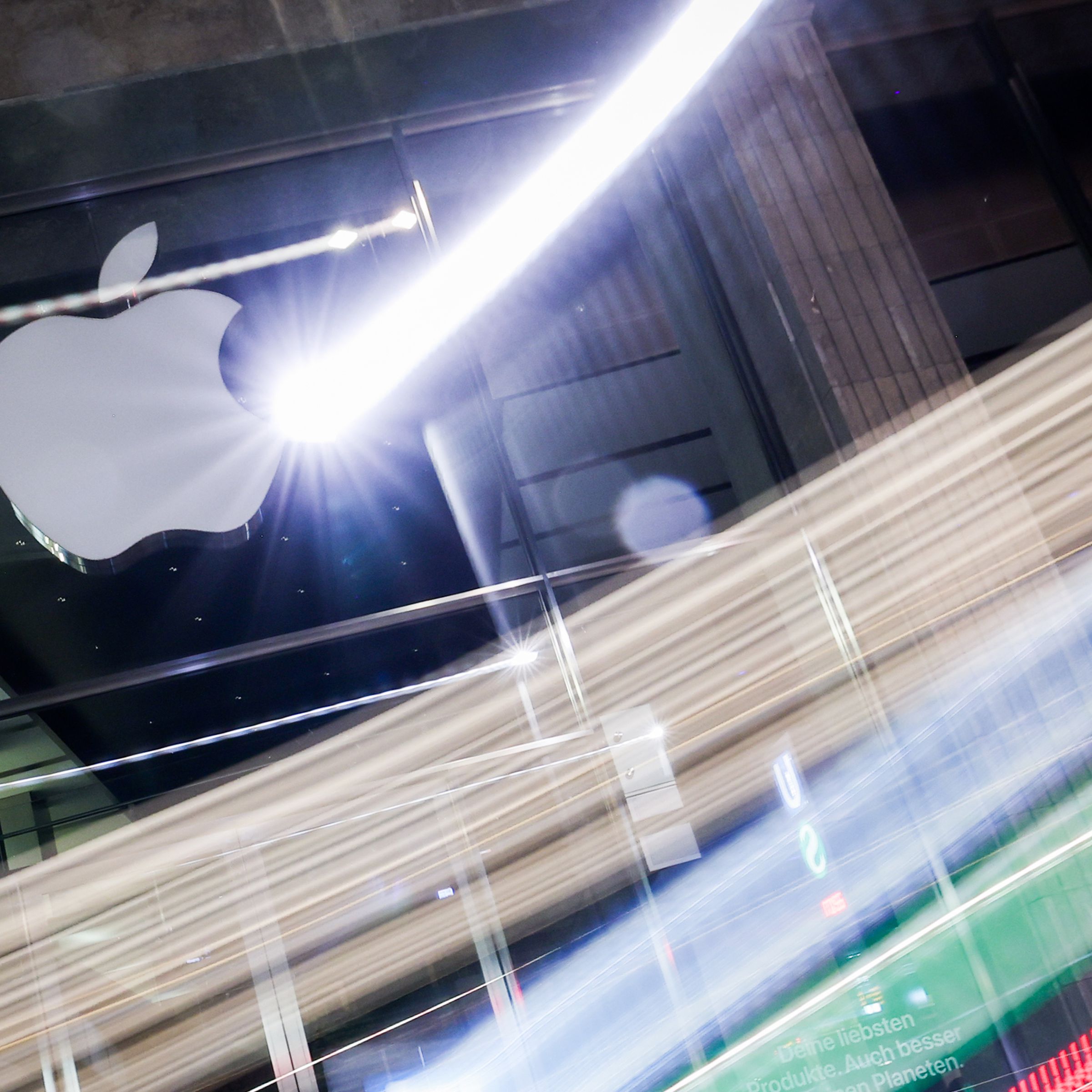 An Apple logo on a glass surface