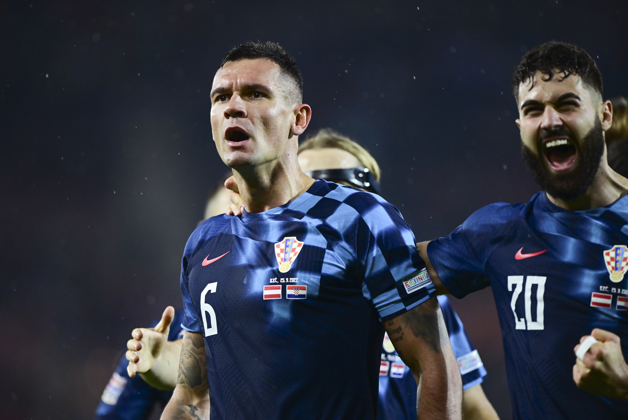 Dejan Lovren (L) of Croatia celebrates with teammate Josko Gvardiol (R)