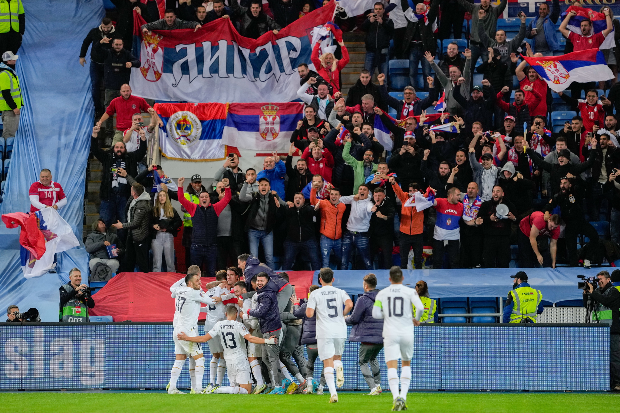 Serbias players in front of their supporters