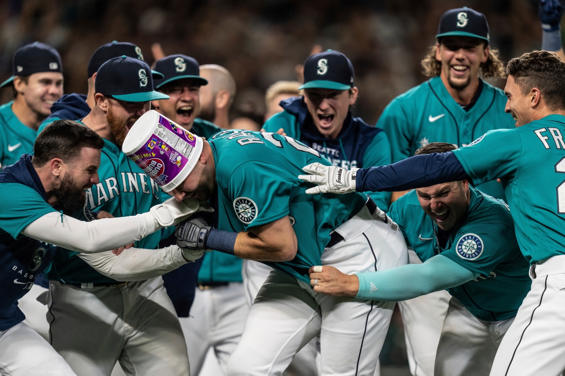 Cal Raleigh hit a game-winning home run with two outs in the bottom of the ninth inning and the Seattle Mariners ended the longest playoff drought in baseball with a 2-1 victory over the Oakland Athletics on Friday night. / AP